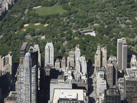 Sunny highrise buildings along Central Park, New York City, New York, USA