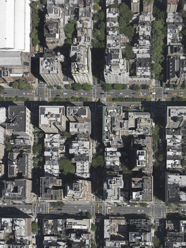 Aerial view sunny highrise rooftops, New York City, New York, USA