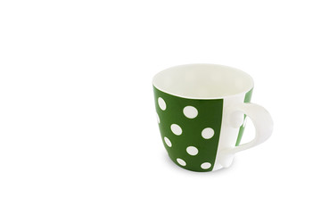Empty green coffee cup with white dots separated from white background.