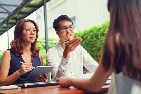 close up manager man with woman (HR) interview with pplicant in private room,we're hiring concept - Powered by Adobe