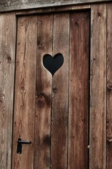 wood door with heart shape