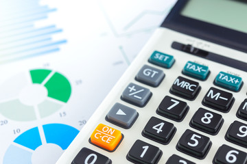 Calculator with Business Graphs finance document.	