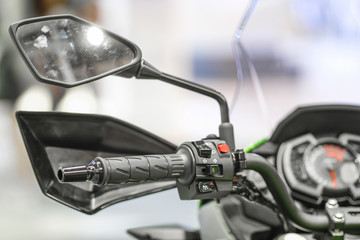 handlebar of a motorcycle close up