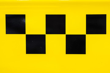 checker pattern of a taxi