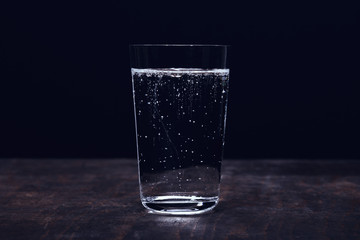 Close up sparkling water in glass