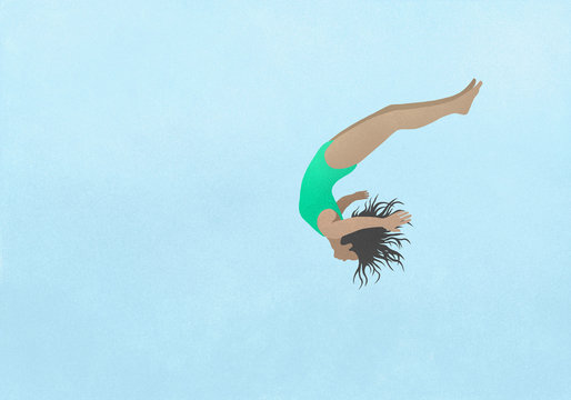 Playful girl in bathing suit diving