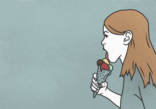 Woman licking ice cream cone on blue background