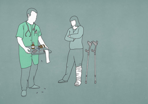 Woman with leg in cast looking at doctor with tray of medicine and supplies