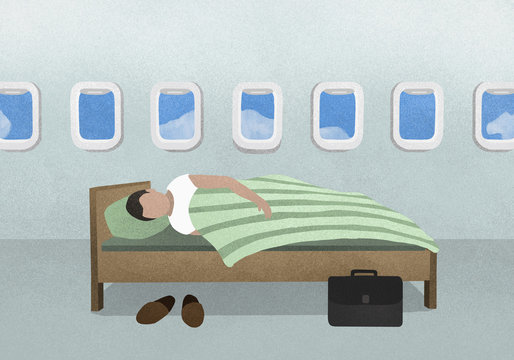 Man sleeping on bed in airplane