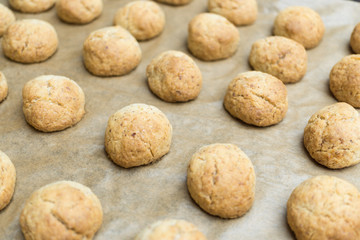 Fototapeta na wymiar Fresh bakened Christmas nut cookies on baking tray