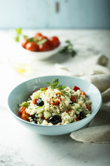 Couscous salad with tomatoes and olives