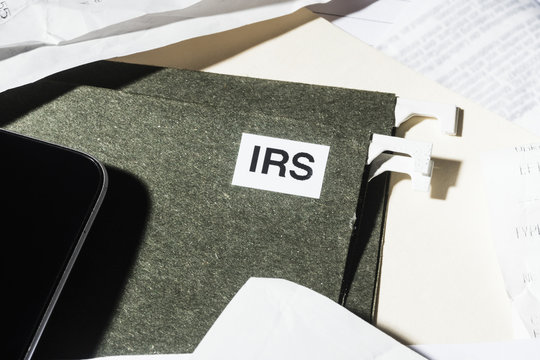 Close up IRS taxes file and finance paperwork