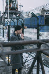 Shipyard worker smoking