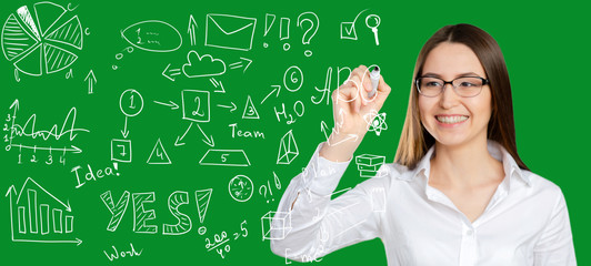 portrait of businesswoman pointing at floating screen