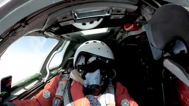 The pilot in the marine suit and helmet