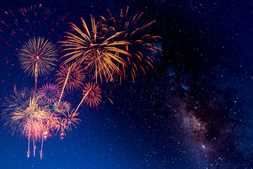 Fireworks with blur milky way background