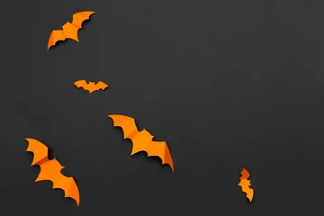 Fotobehang halloween and decoration concept - paper bats flying © fotofabrika