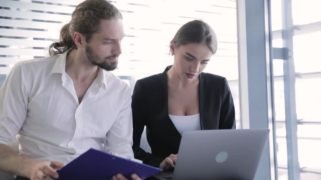Business Office. Man And Woman Working At Computer