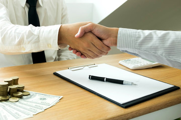 Business handshake. Business people shaking hands, finishing up a meeting,Success agreement negotiation.Business concept.