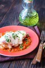 Chicken with pepperoni and tomato sauce