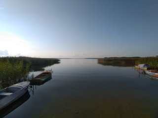 Landscape With Water And Some Boats