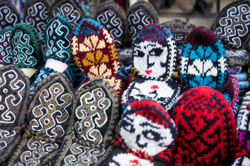 Market stalls with decorative tribal textile with colourful pattern made in Central Asia, Uzbekistan.