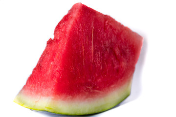 Pieces of red juicy watermelon sliced with a knife