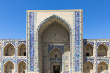 Fototapeta na wymiar Madrasa facade in Bukhara, Uzbekistan.Traditional architecture.