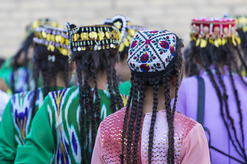 Folk dancers performs traditional dance at local festivals in Khiva, Uzbeksitan. - obrazy, fototapety, plakaty