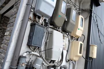 Electricity meters outside building in Japan