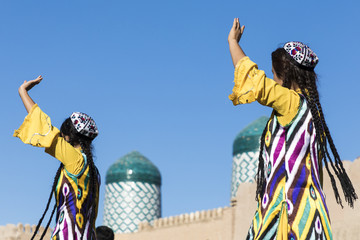 Folk dancers performs traditional dance at local festivals in Khiva, Uzbeksitan.
