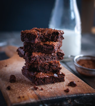 Close-up of homemade chocolate brownies on cutting board