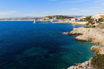 Fototapeta na wymiar Azure coast with blue waters in Nice