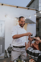 Friends toasting with red wine