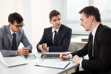 Fototapeta premium Businessmen working in an office