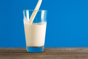 Fresh milk is poured into a glass.