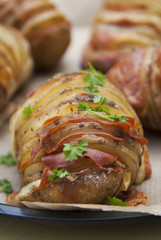 Baked potatoes with bacon and cheese. Potato food. Dish for dinner. Close up view. Top view, flat lay