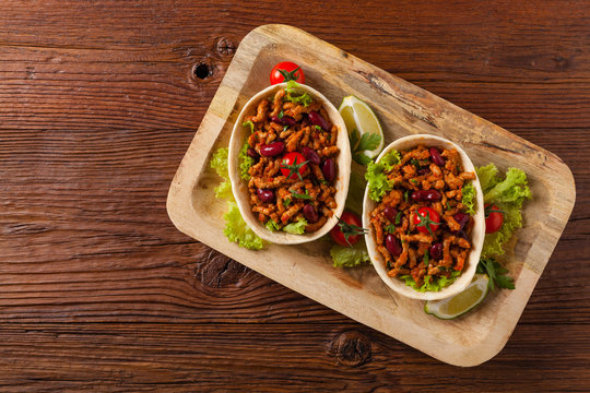 Buritos in stuff stands.