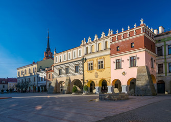 Fototapeta na wymiar Scenic view of renaissance tenement houses on market square of old town in Tarnow, Poland