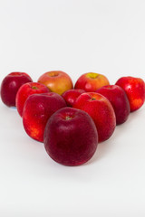 Red apples on the white background 