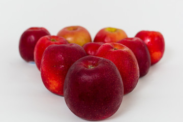 Red apples on the white background 