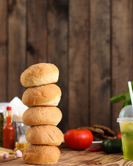 burger with meat, lettuce leaves and sauce (fast food). Sandwiches with meat. . food background. top view