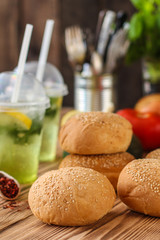 burger with meat, lettuce leaves and sauce (fast food). Sandwiches with meat. . food background. top view