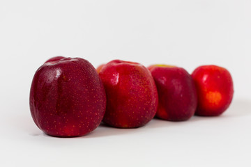 Fototapeta na wymiar Red apples on the white background 