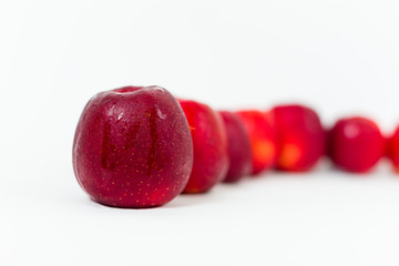 Red apples on the white background 