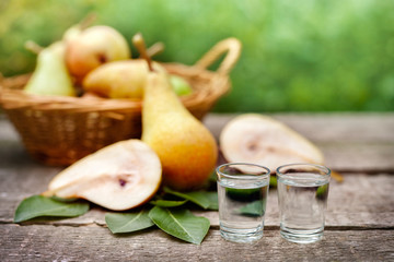 Pear brandy alcohol drink in shot glass