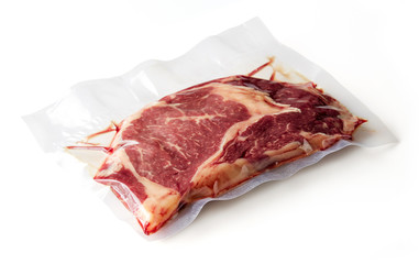 Beef steak vacuum sealed isolated on white