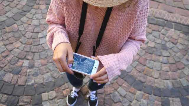 Young Woman Tourist Taking Pictures Of Feet With Smartphone. Vacation In Europe.