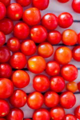 Cherry tomatoes on the kitchen table.