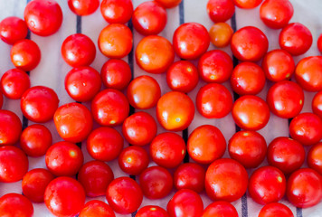 Cherry tomatoes on the kitchen table.